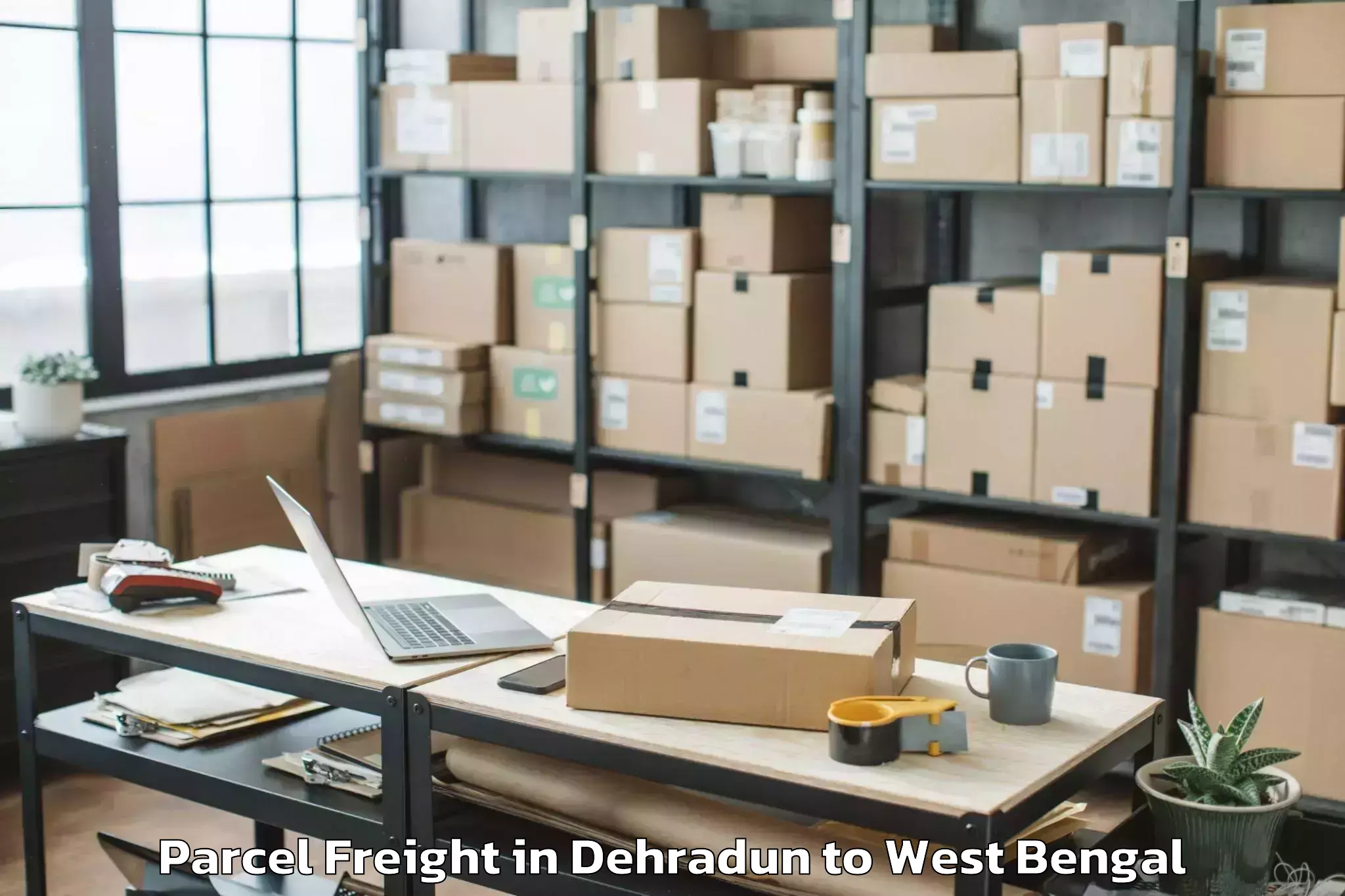 Book Your Dehradun to Chandrakona Road Parcel Freight Today